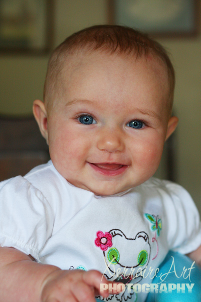 RubÃ­ smiles at Nana who is taking the photo