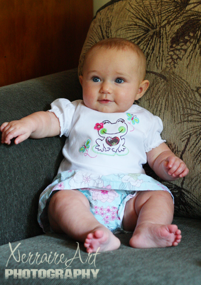 She is sitting up well by herself at 5 months!