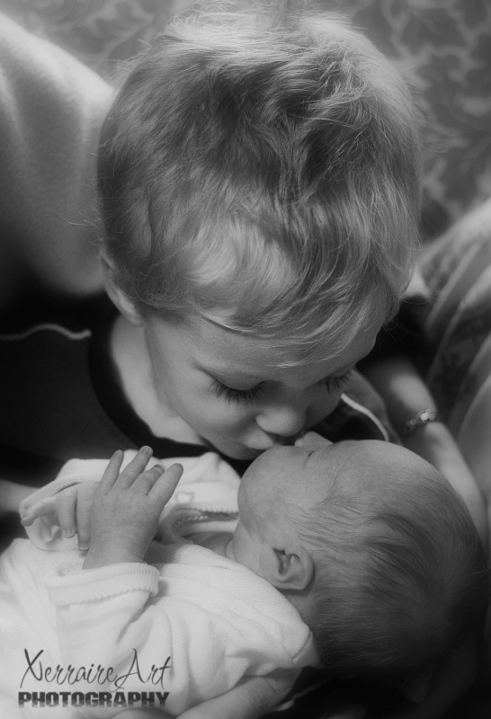 Big Brother Kisses Baby Rubi