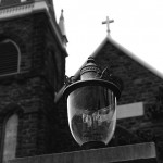 Black and white of an old time lamp at Harpers Ferry