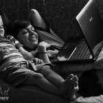 Silas and Laura watching You Tube on the laptop