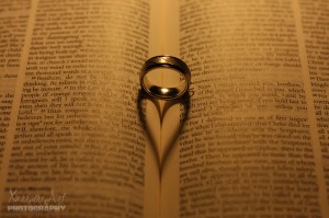 Classic wedding ring in a bible shot